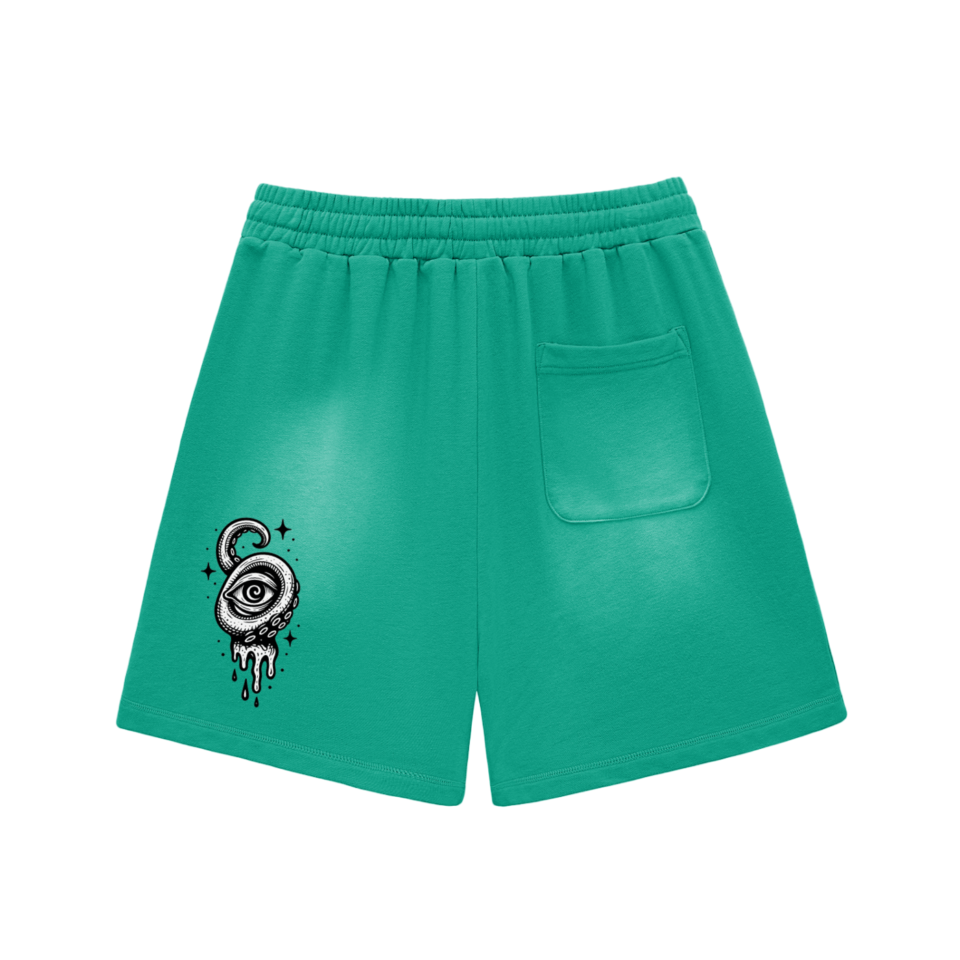 Green shorts with alternate symbolic eye artwork on back