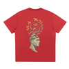 Rear design with abstract geometric head and golden bird swirls on red t-shirt

