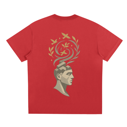 Rear design with abstract geometric head and golden bird swirls on red t-shirt

