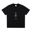 Front view of Mind Bloom tee with abstract head and golden birds design printed on black Sorona® cotton blend
