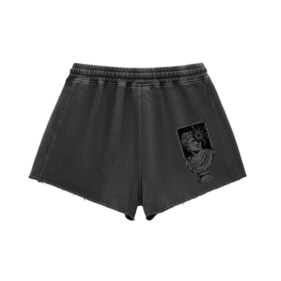 Back view of black high waisted women's cotton shorts with frayed hem