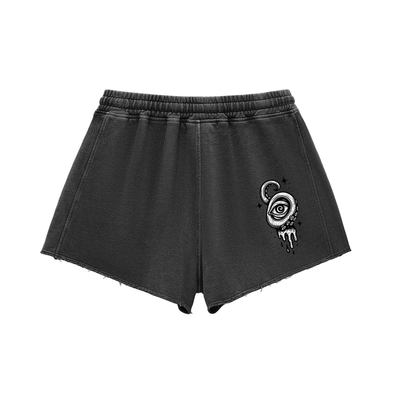 women's black cotton shorts back with melting eye design detail

