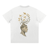 Back of white Mind Bloom shirt showcasing artistic birds and leaves emerging from head


