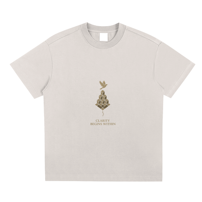 Apricot front display of Mind Bloom tee with elegant golden art print
