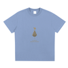 Front of oversized sky blue tee with signature Mind Bloom golden print
